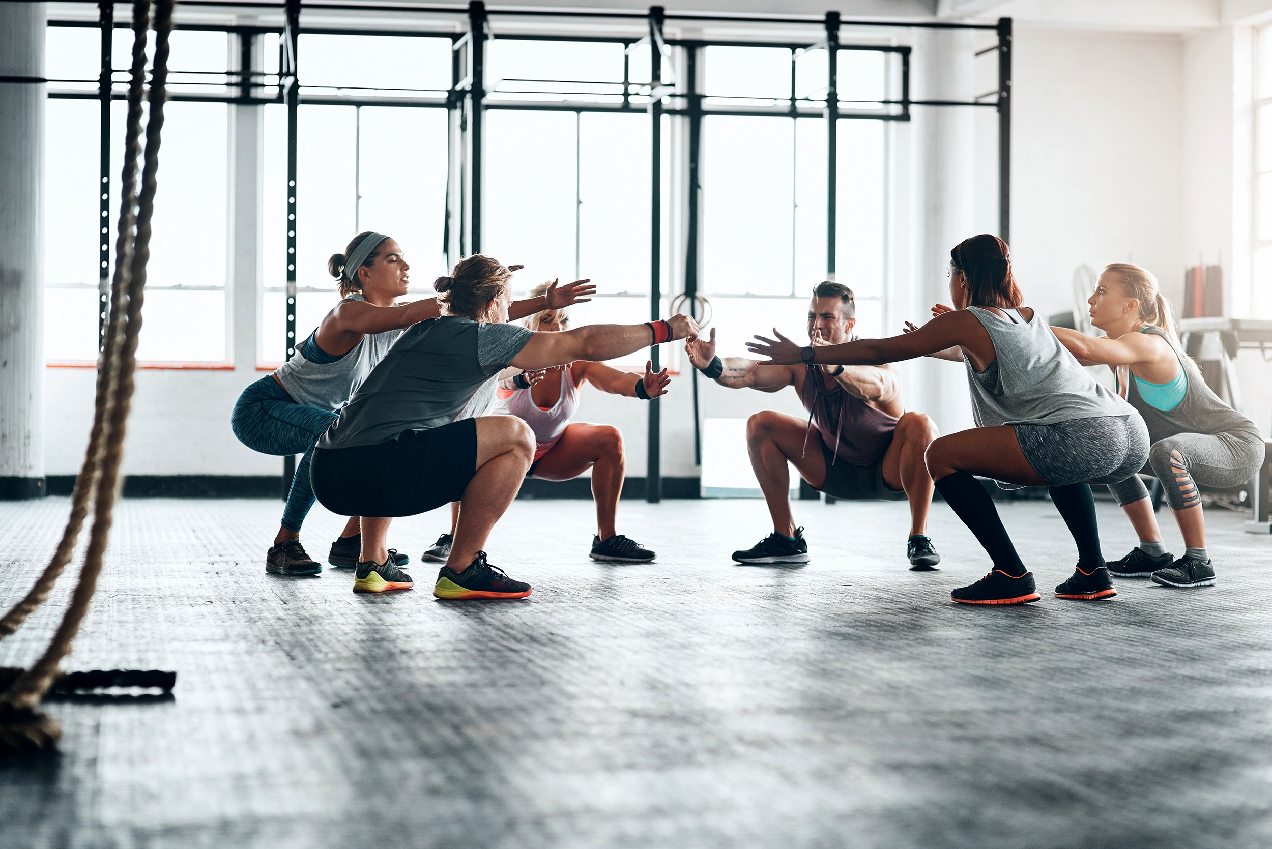 Shot of a fitness group working out at the gym